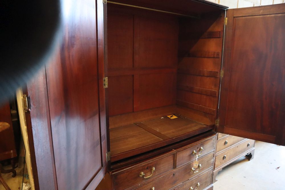 An early 19th century mahogany linen press, width 117cm height 187cm